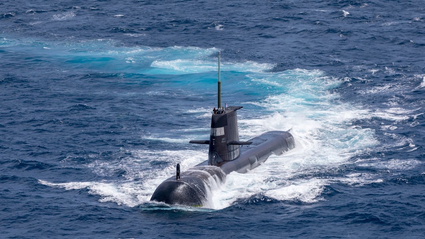 A submarine emerges from water