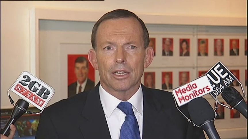 Abbott diverts focus after Slipper resignation fallout