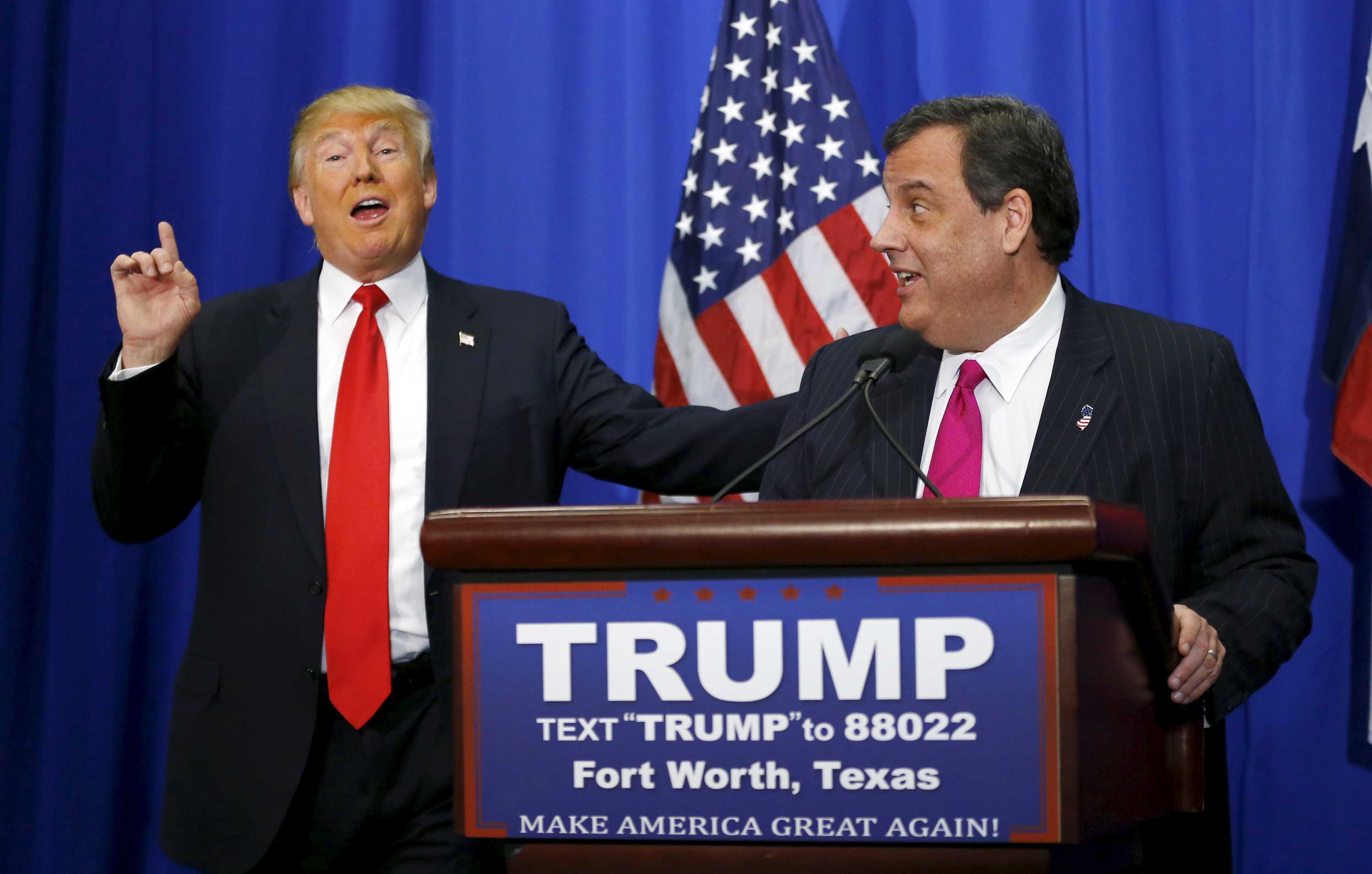 Donald Trump and Chris Christie at a podium.
