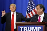 Donald Trump and Chris Christie at a podium.
