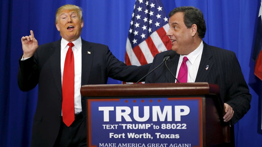 Donald Trump and Chris Christie at a podium.