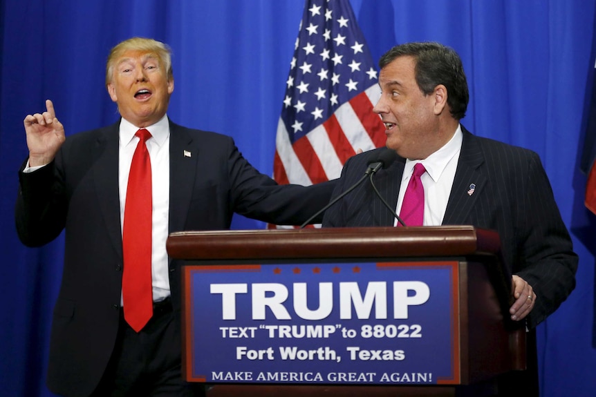 Donald Trump and Chris Christie at a podium.