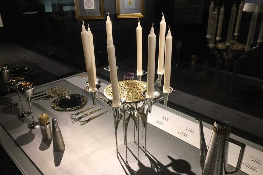 Candelabrum and place setting on display at the Royal Australian Mint.