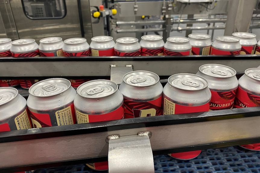 Beer cans coming of a production line.