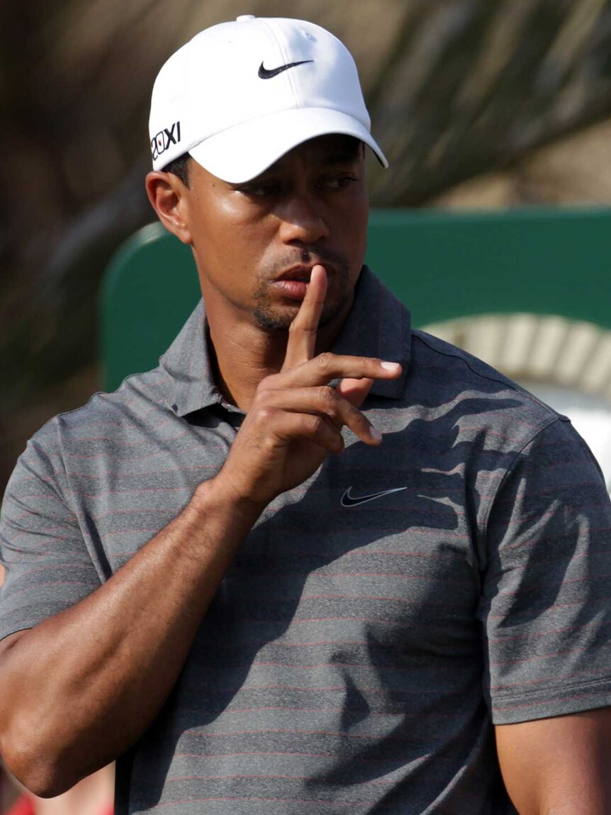 Woods asks for quiet on the tee