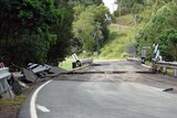 Flood damaged road at Kin Kin on Sunshine Coast