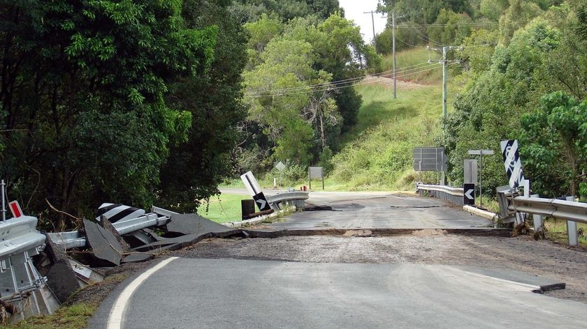 Flood damaged road at Kin Kin on Sunshine Coast