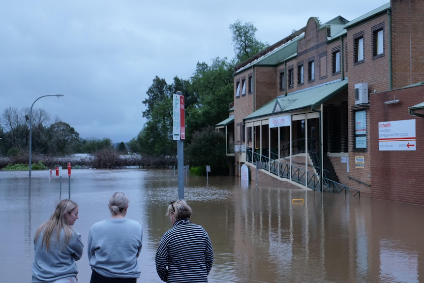 A health clinic is surrounded by floodwaters in Windsor.