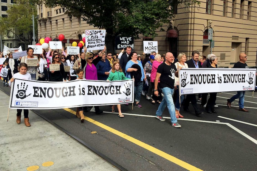 Protesters march to the steps of Victoria's Parliament House.