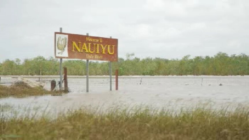 Nauiyu welcome sign during flooding