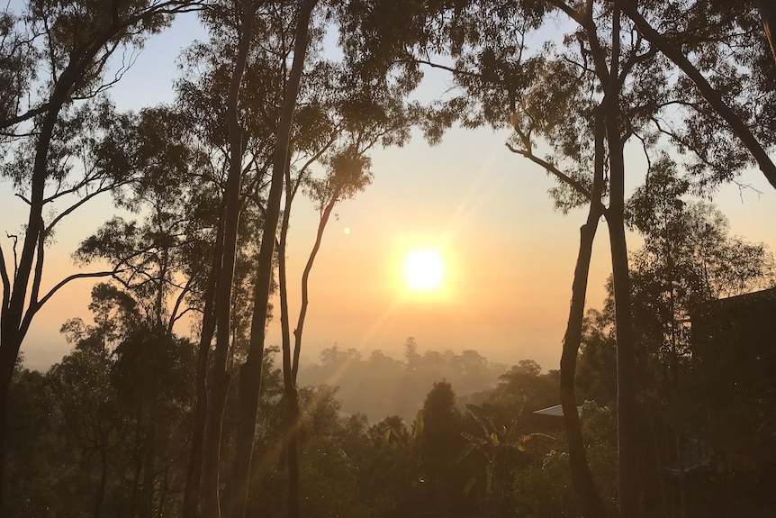 a hazy, smoky sunrise