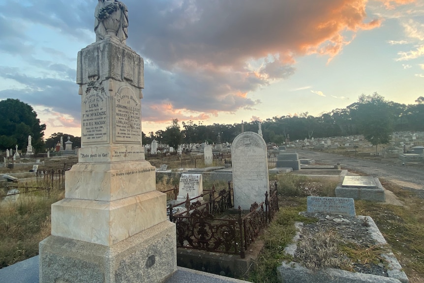 graceyard with old graves and nice sunset