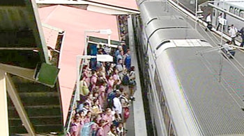 Sydney train platforms are crowded as service disruptions continue.