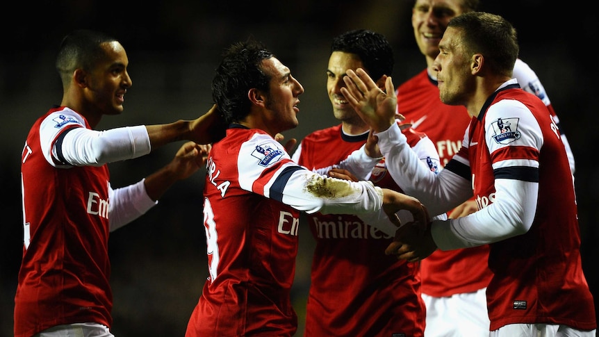 Midfield wizard ... Arsenal's Santi Cazorla is congratulated on his way to a clinical hat-trick.