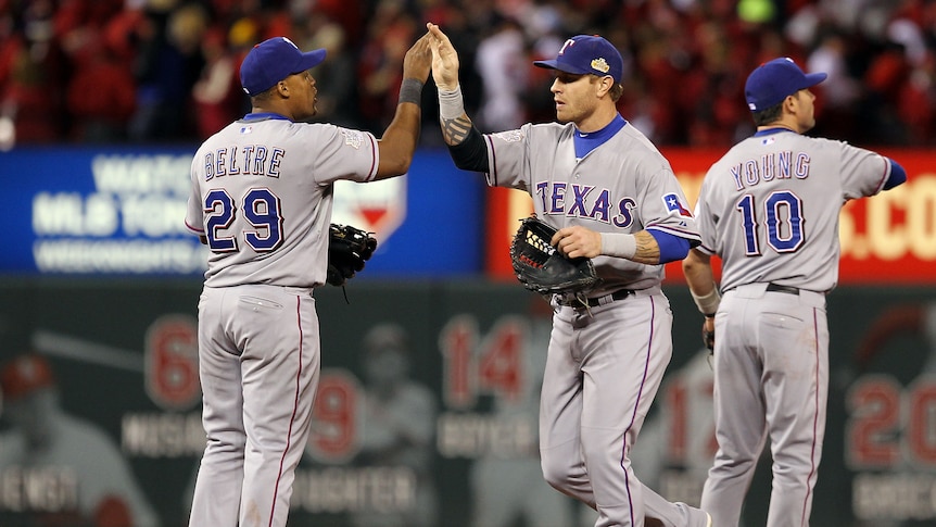 All square ... Adrian Beltre (L) and Josh Hamilton of the Rangers celebrate the win  (Ezra Shaw: Getty Images)