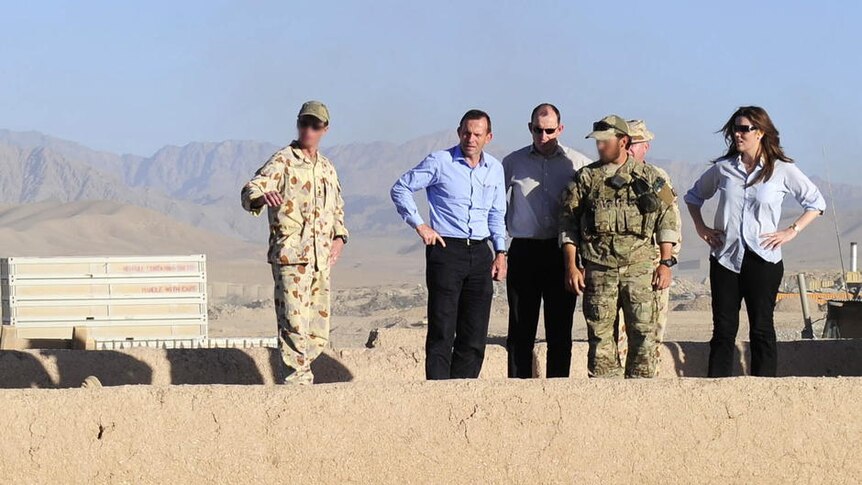 Opposition Leader Tony Abbott watches a training exercise in Afghanistan