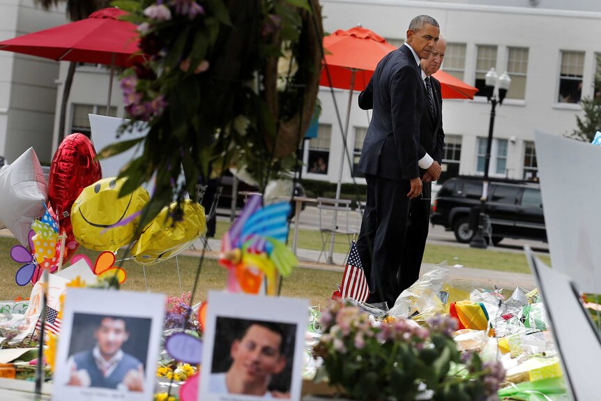 Barack Obama visits the Orlando shooting memorial