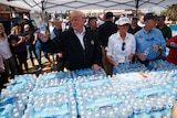 Donald and Melania Trump help hand out water bottles after Hurricane Michael