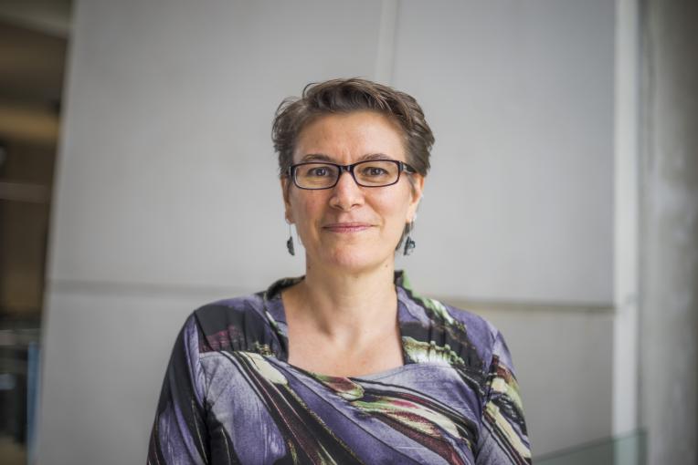 Sarah Maddison smiles at the camera.