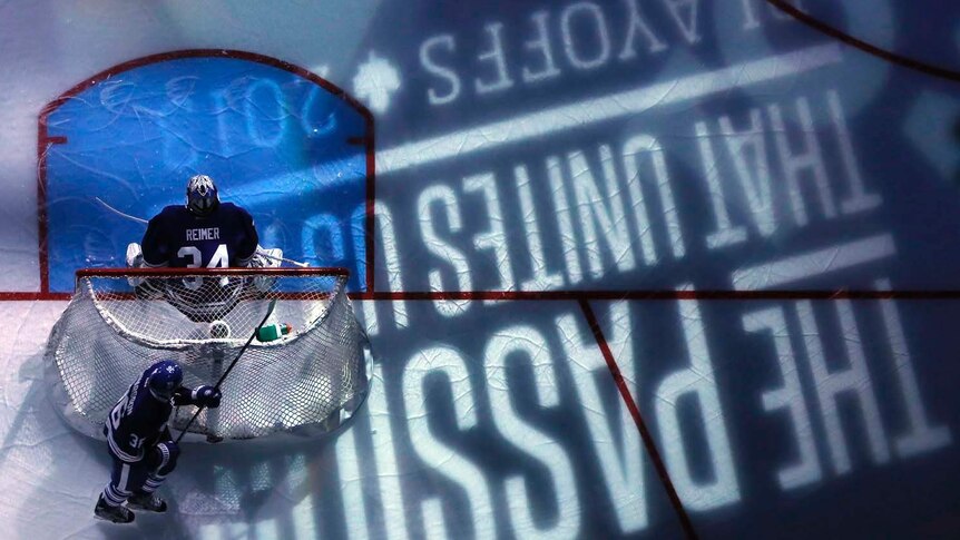 Toronto Maple Leafs ice hockey players warm up before their NHL quarter-final playoff match