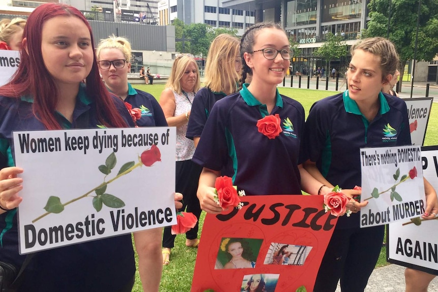 A crowd outside the Supreme Court at Brisbane for a vigil against domestic violence on February 27, 2017.