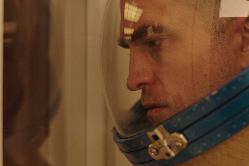The actor Robert Pattinson in a space helmet in the film High Life