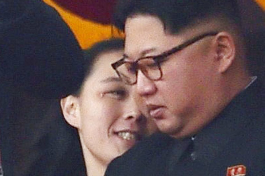 North Korean leader Kim Jong-un and his sister Kim Yo-jong watch a military parade at Kim Il-sung Square in Pyongyang.