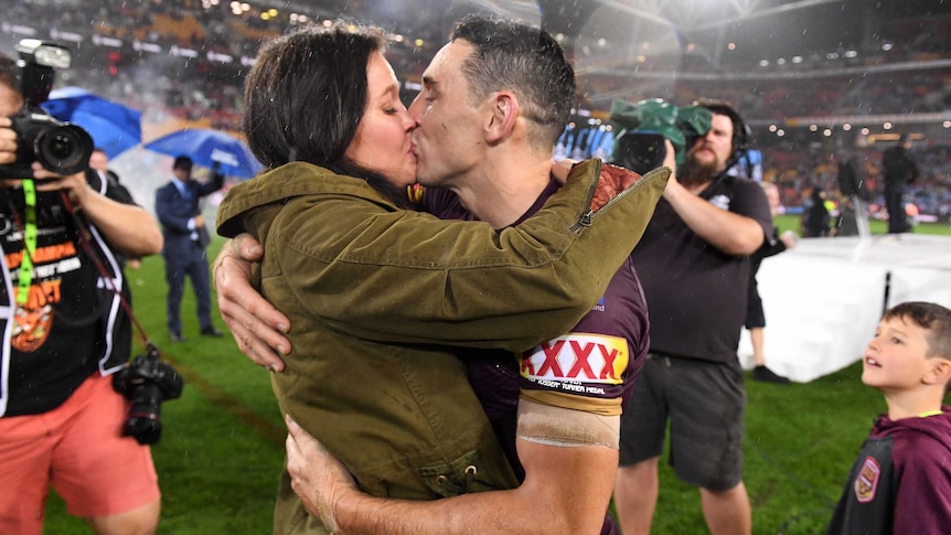 Billy Slater kisses his wife Nicole after Queensland won State of Origin III.