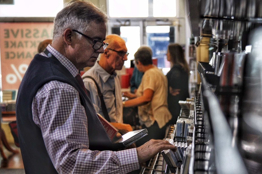 Customers browse through classical music CDs.