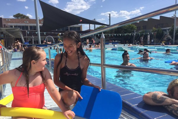 Swimmers escape the extreme heat