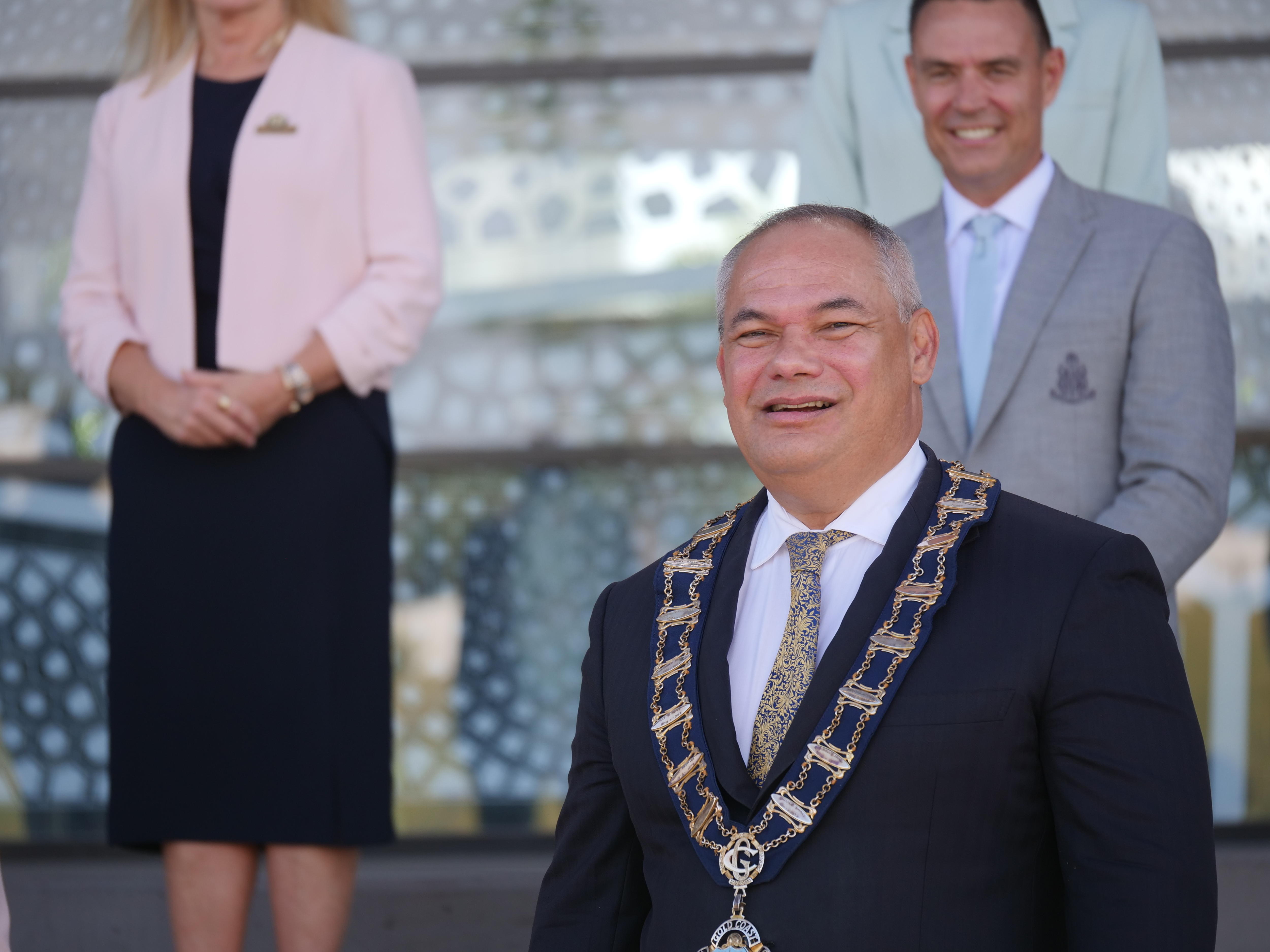 man in suit squinting and looking ahead