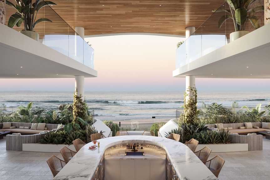 Building with a bar and the beach in background.