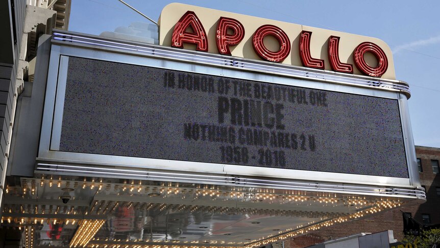 The marquee of the Apollo Theatre announces the death of Prince.