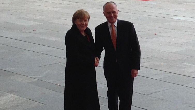 Malcolm Turnbull arrives in Berlin with Angela Merkel