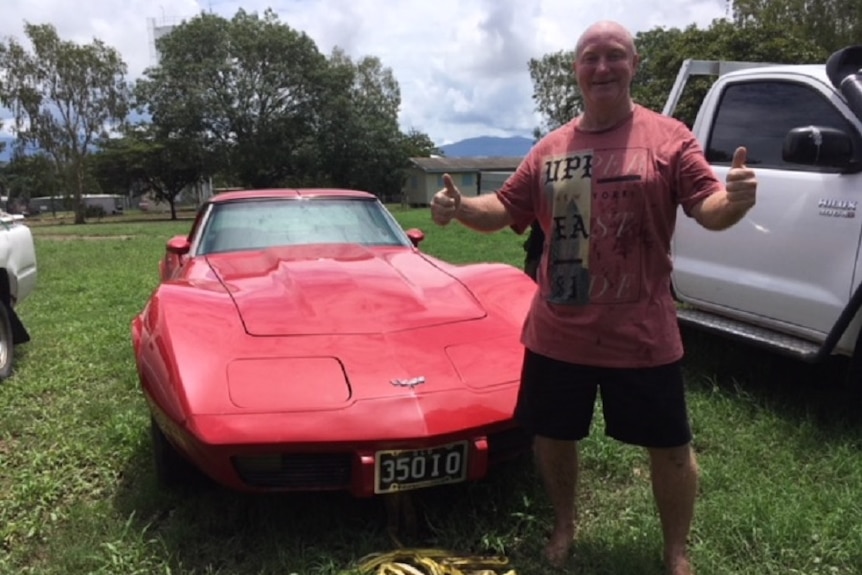 Giru resident Rodney Jackson gives a thumbs up in front of his Corvette