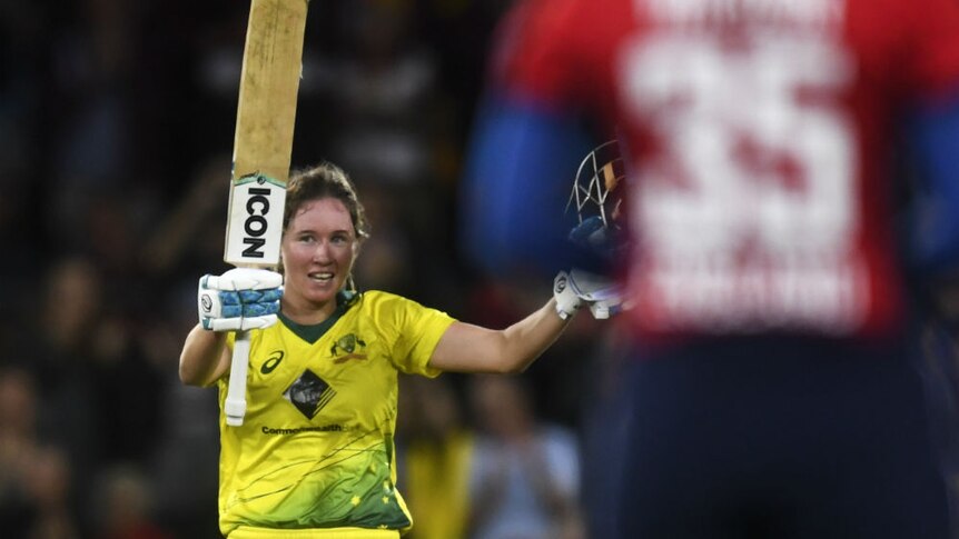 Beth Mooney of Australia celebrates her century during the third Womens Ashes T20 match.