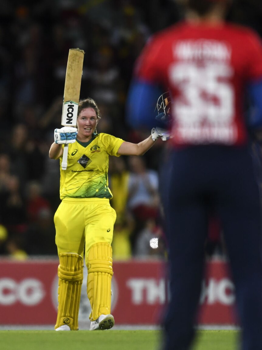 Beth Mooney of Australia celebrates her century during the third Womens Ashes T20 match.