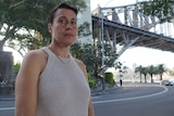 Helen McMaugh stands under the Sydney Harbour Bridge