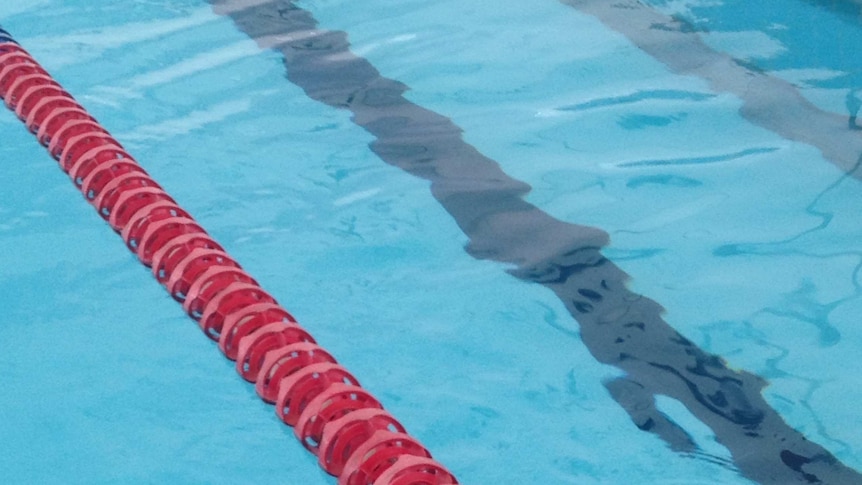 Swimming pool with lane rope.