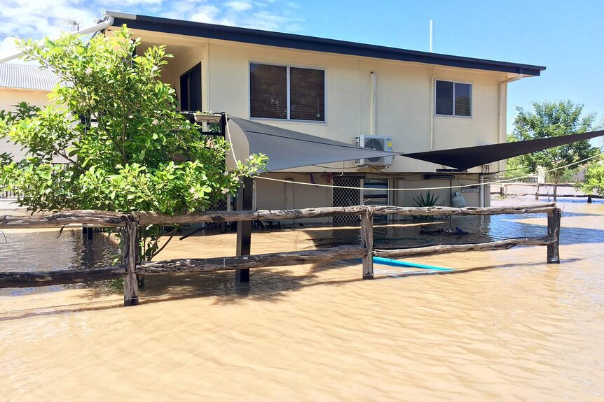 A house in Rockhampton is slowly swamped by rising floodwaters on April 5, 2017