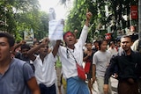 Protestors chanting slogans during a protest rally in downtown Rangoon, Burma.
