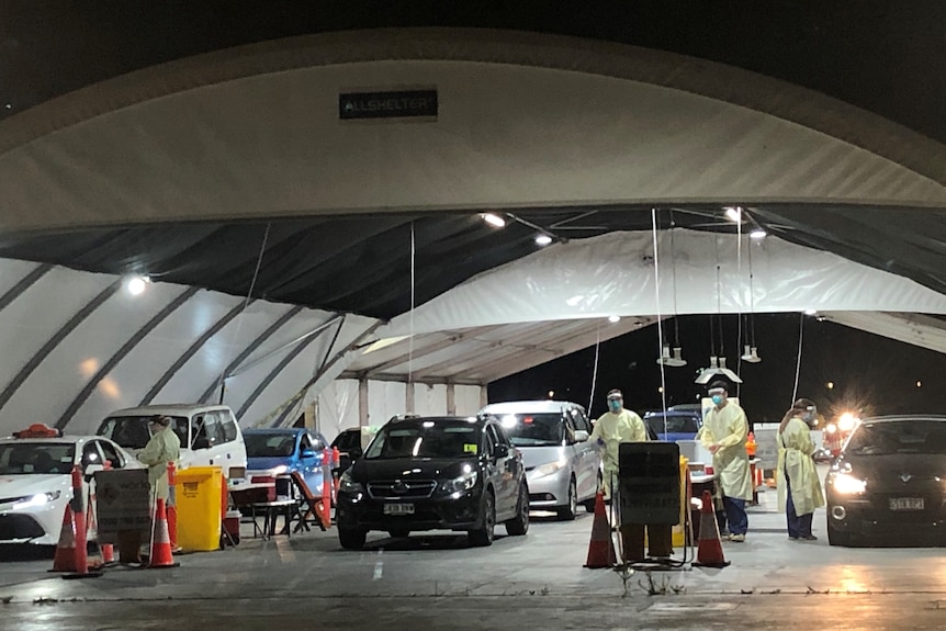 A queue of cars at Victoria Park COVID-19 testing station. 