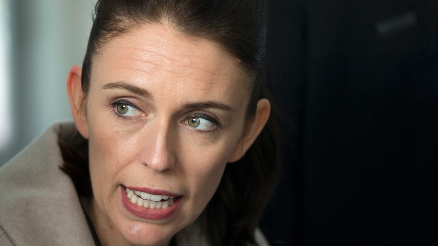 Jacinda Ardern looks uncomfortable as she speaks at a media event