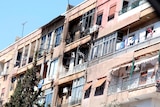 Bullets damage houses after a heavy firefight in Damascus