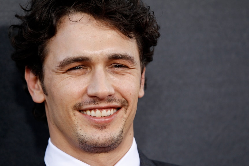 Actor James Franco smiles for the camera.