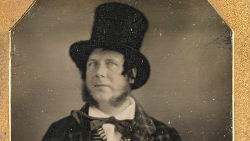 man in waistecaiost and top hat taken in 1848 by J.W Newland