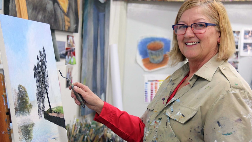 Margaret Hadfield painting in studio