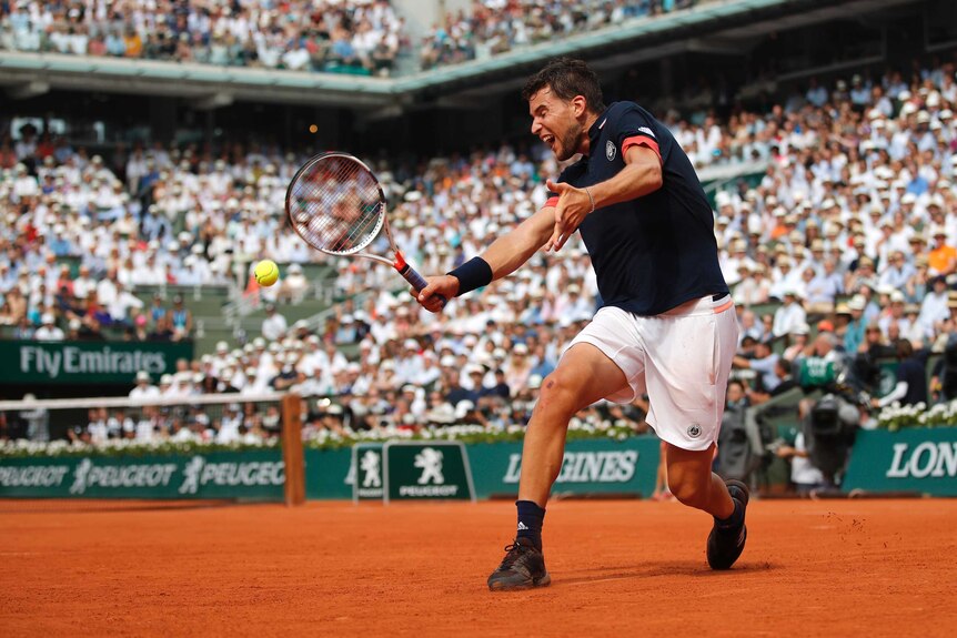 Austria's Dominic Thiem returns the ball to Spain's Rafael Nadal in the French Open final in Paris.