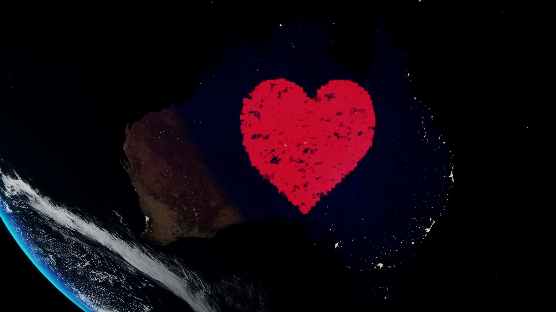 Choir participants form a heart over the continent of Australia in this still from ABC's Classic Choir video of All is Love.