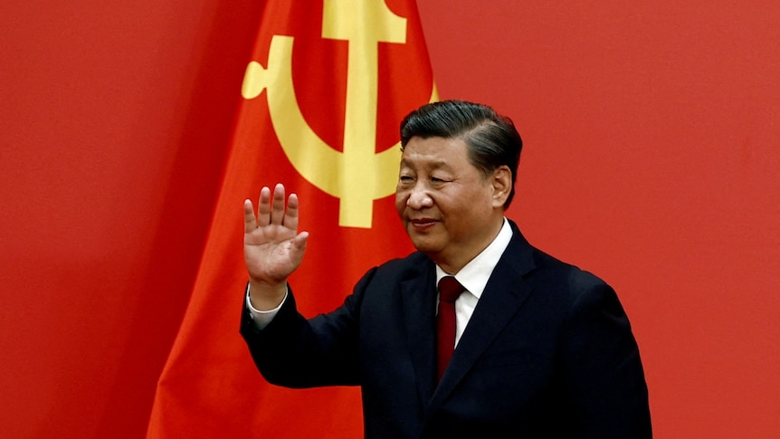 Xi Jinping against a red background with the Communist Party symbol. 